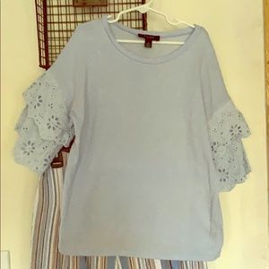 Light blue knit top with eyelet belled sleeves
